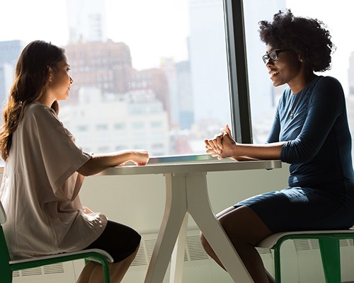 Two women conversing